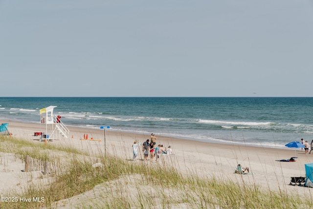 water view featuring a beach view