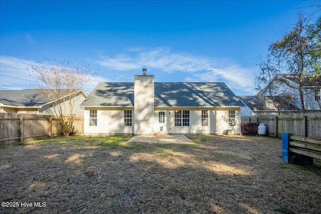 rear view of house with a patio