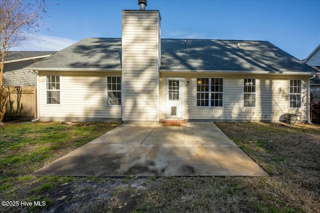 rear view of property with a patio area