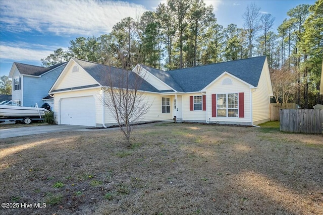 ranch-style home featuring a garage