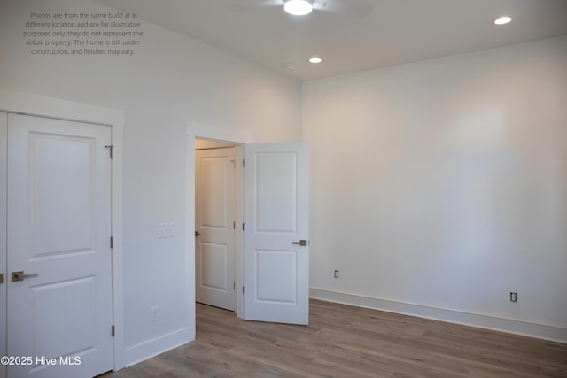 unfurnished bedroom with light hardwood / wood-style floors