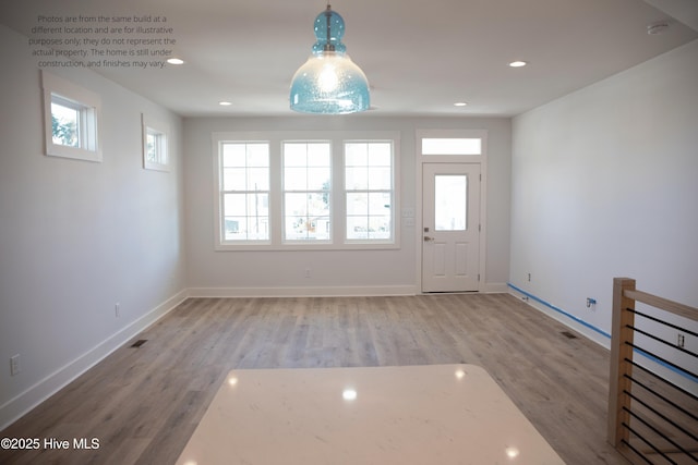 entrance foyer with hardwood / wood-style flooring