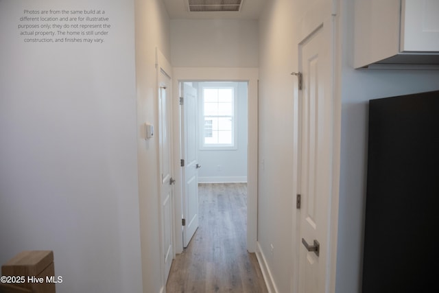 hall featuring light wood-type flooring