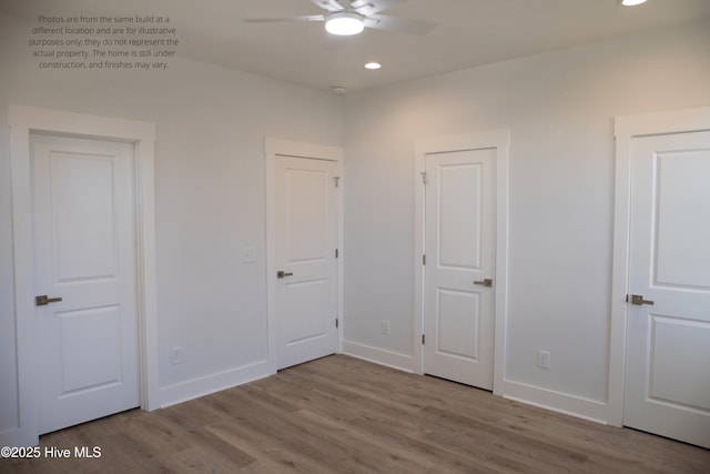 unfurnished bedroom with light hardwood / wood-style flooring