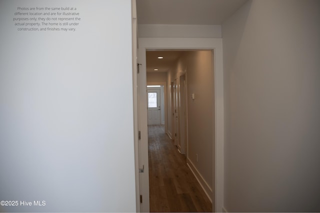 hallway featuring dark wood-type flooring