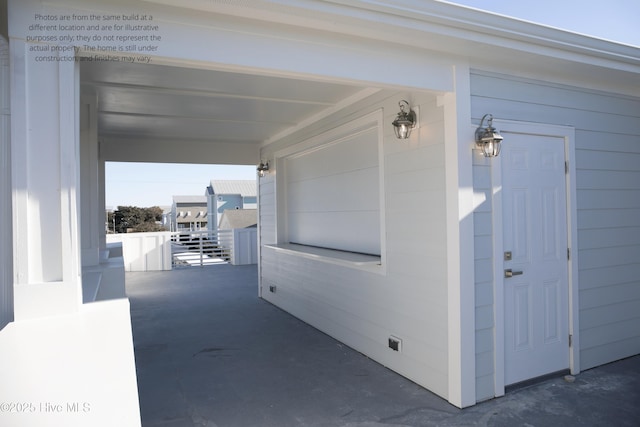 view of patio featuring a garage