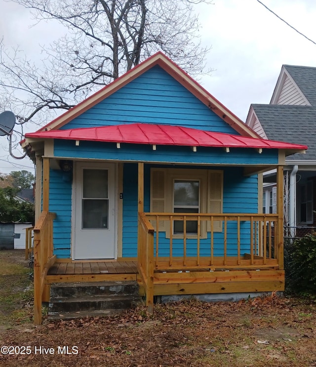 bungalow-style home with covered porch