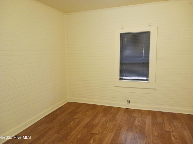 empty room featuring hardwood / wood-style floors