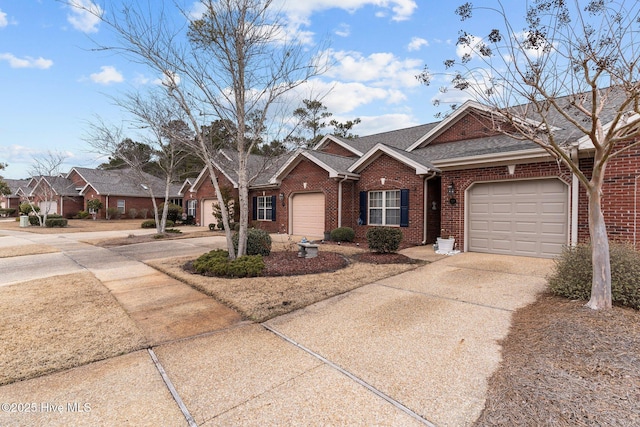 single story home with a garage