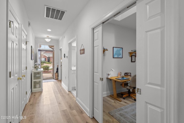 hall featuring light hardwood / wood-style floors