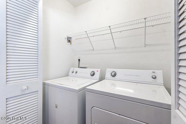 laundry area with washer and dryer