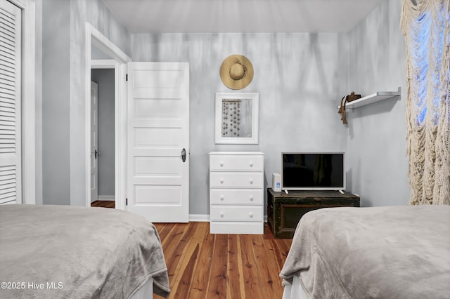 bedroom featuring hardwood / wood-style flooring