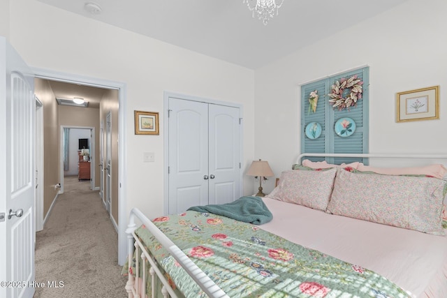 carpeted bedroom with a closet