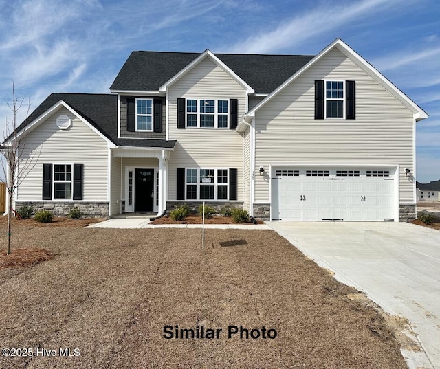 view of front of house with a garage