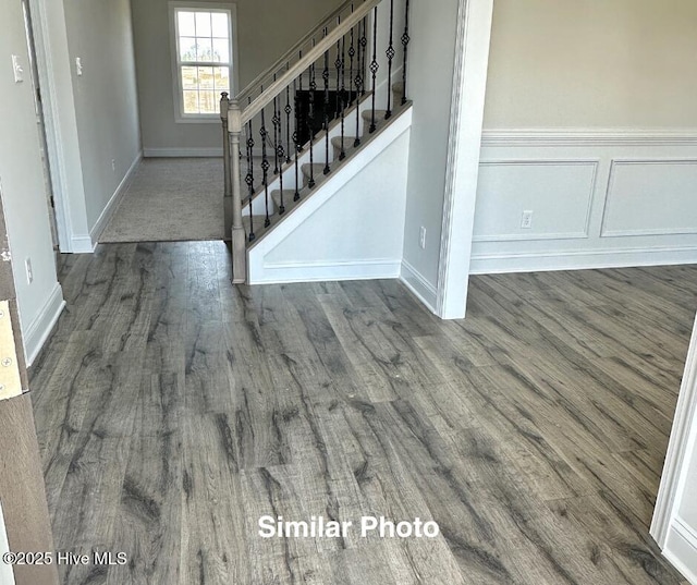 entrance foyer featuring hardwood / wood-style floors