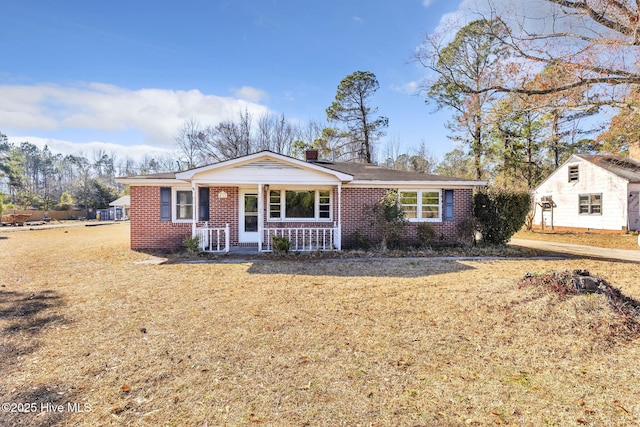 ranch-style home with covered porch