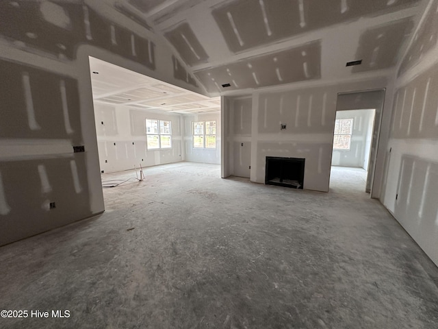 unfurnished living room with a fireplace