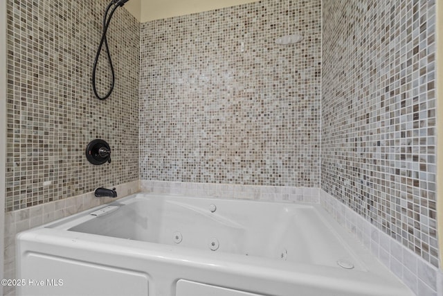 bathroom featuring bathing tub / shower combination