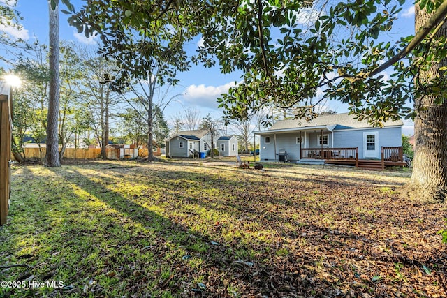 view of yard with a deck