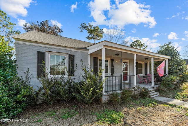 view of front of property featuring covered porch