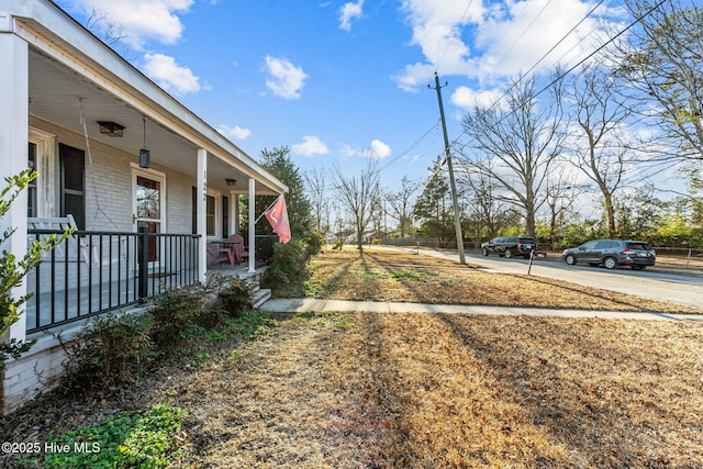 view of yard with a porch