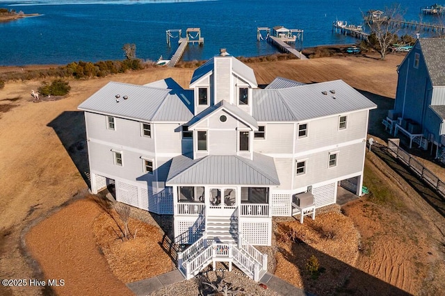 aerial view featuring a water view