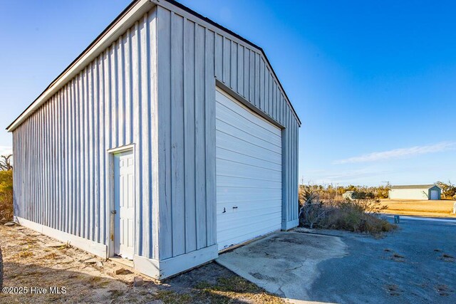 view of outbuilding with a garage