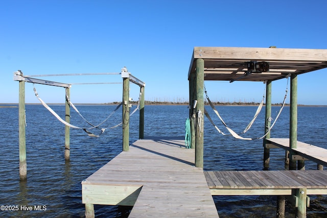 view of dock with a water view