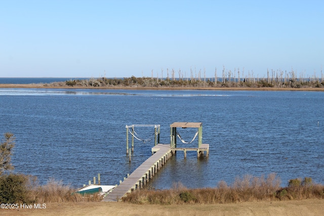 view of dock with a water view