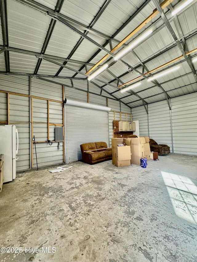 garage with white fridge