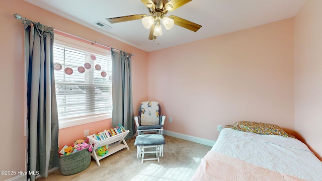 carpeted bedroom with ceiling fan