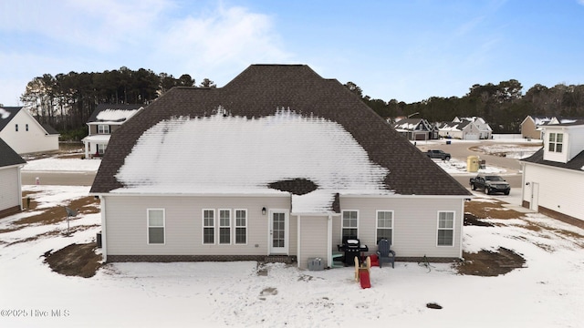 view of snow covered property