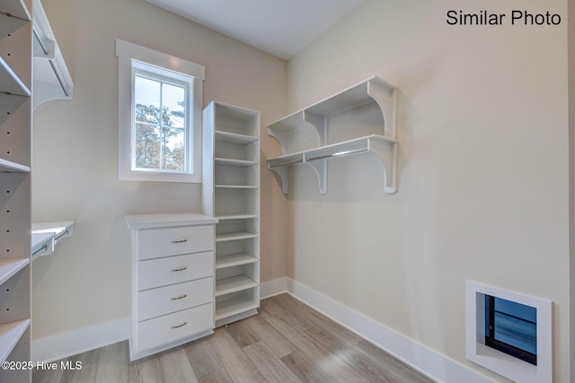 7245 Winding Marsh Ct, Wilmington, NC 28411 - walk in closet featuring light wood-style floors