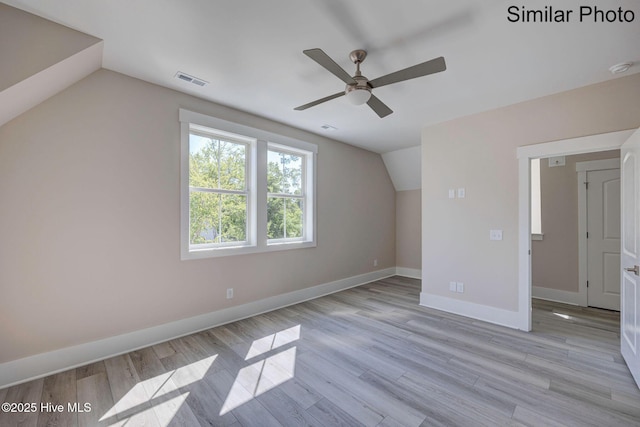 7245 Winding Marsh Ct, Wilmington, NC 28411 - bonus room with lofted ceiling, a ceiling fan, baseboards, and light wood-type flooring