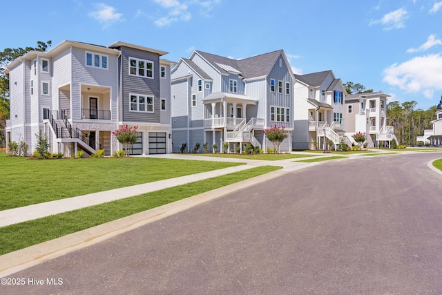 exterior space with a residential view, sidewalks, and stairway