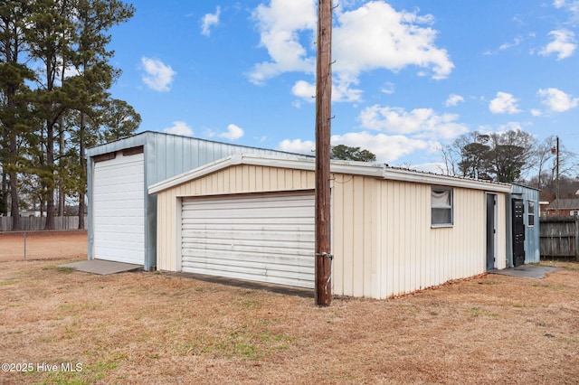 garage with a lawn