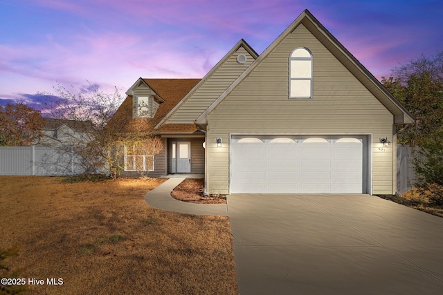 view of front of property with a garage