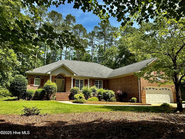 205 Firestone Ct, New Bern, NC 28562 - ranch-style home with brick siding, a front lawn, a garage, and a shingled roof