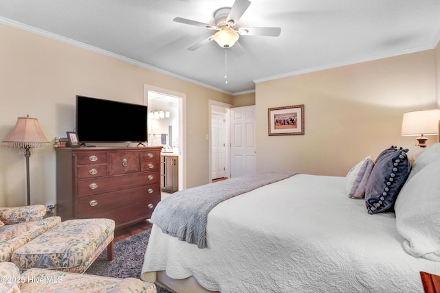 bedroom featuring crown molding, ceiling fan, hardwood / wood-style floors, and ensuite bath