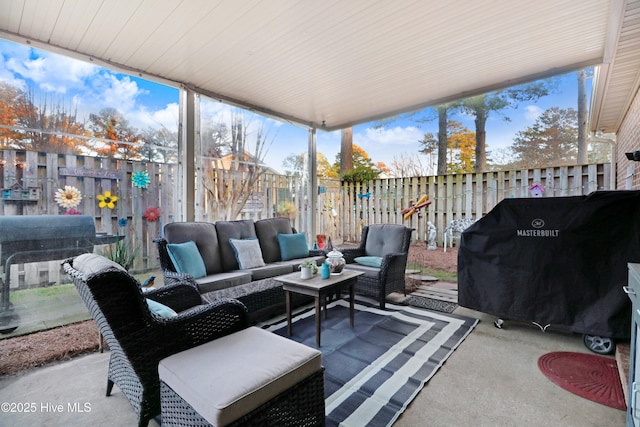 view of patio / terrace featuring outdoor lounge area and a grill