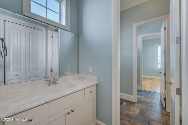 unfurnished room featuring crown molding, ceiling fan, and light wood-type flooring