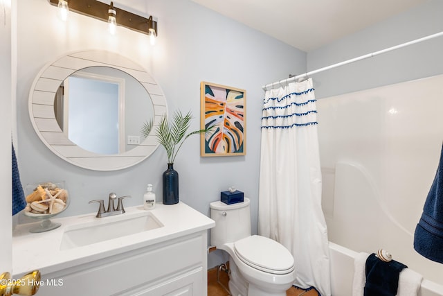 full bathroom with vanity, toilet, and shower / tub combo