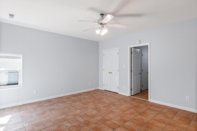 empty room with ceiling fan