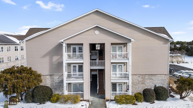 view of front of home with a balcony