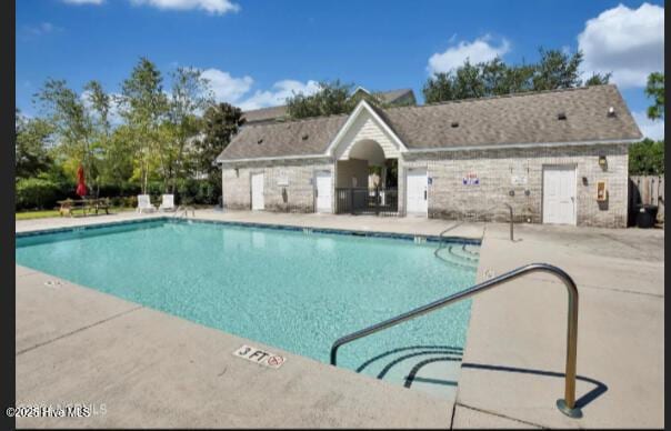 view of pool featuring a patio