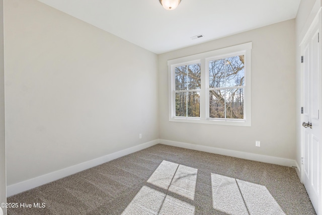 view of carpeted spare room