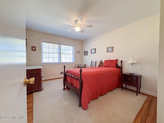 bedroom featuring ceiling fan and hardwood / wood-style floors