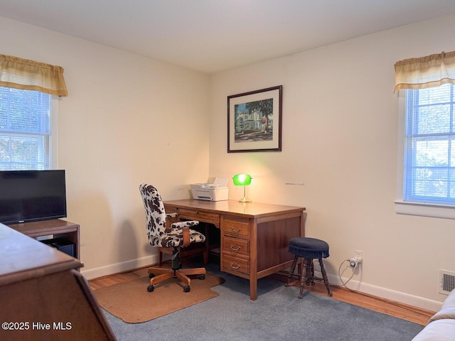 home office featuring light hardwood / wood-style flooring