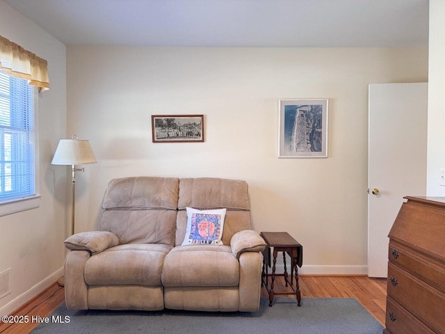 sitting room with light hardwood / wood-style floors