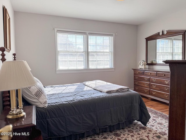 bedroom featuring hardwood / wood-style floors